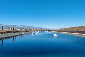 Water view with a mountainous background