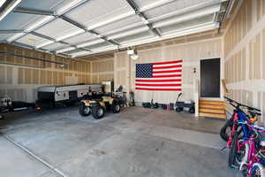 Finished oversized 3-Car Garage with tall ceilings