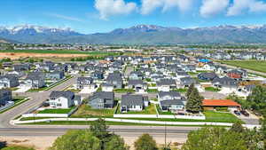 Aerial view of residential area featuring mountains