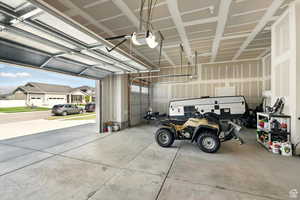 Finished oversized 3-Car Garage with tall ceiling