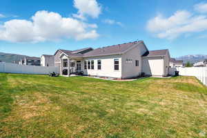 Back of house featuring a covered patio and a mountain view