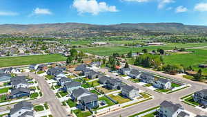 Aerial view of residential area featuring mountains