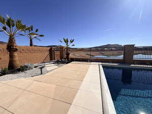 Fenced backyard featuring an outdoor pool