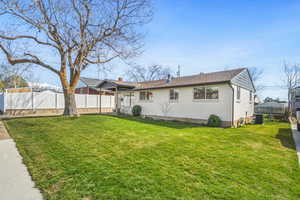 Back of property with brick siding