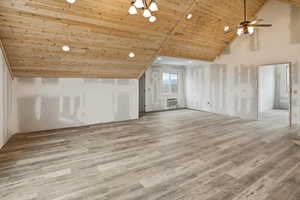 Bonus room with a vaulted wooden ceiling, light wood-style flooring, ceiling fan, and recessed lighting