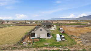 Aerial view of sparsely populated area featuring a mountainous background