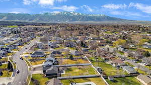 Aerial view of residential area with a mountainous background