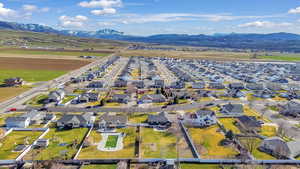 Aerial view of residential area featuring mountains