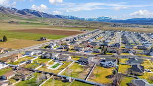 Aerial view of residential area featuring mountains