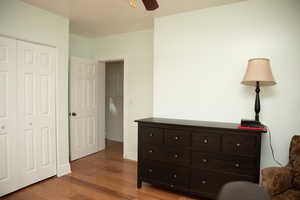 Bedroom 2 featuring wood-style flooring and a ceiling fan