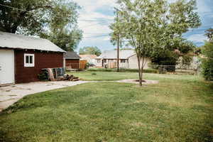 Fenced yard with a patio