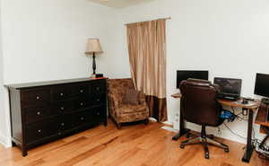 Bedroom 2 featuring light wood-style flooring