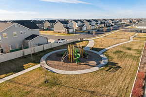 Aerial perspective of Stillwater Community amenities including playground and walking paths
