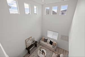View of living room from second floor hallway