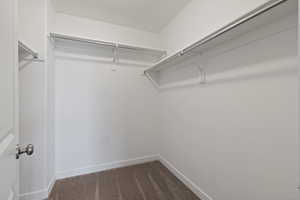 Primary bedroom walk-in closet