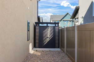 Gate featuring a storage unit