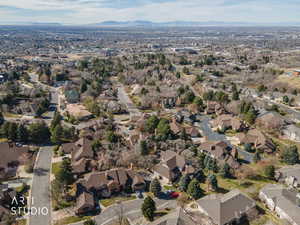 View of property location featuring a mountain backdrop and nearby suburban area