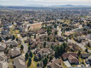 View of property location featuring a mountainous background and nearby suburban area