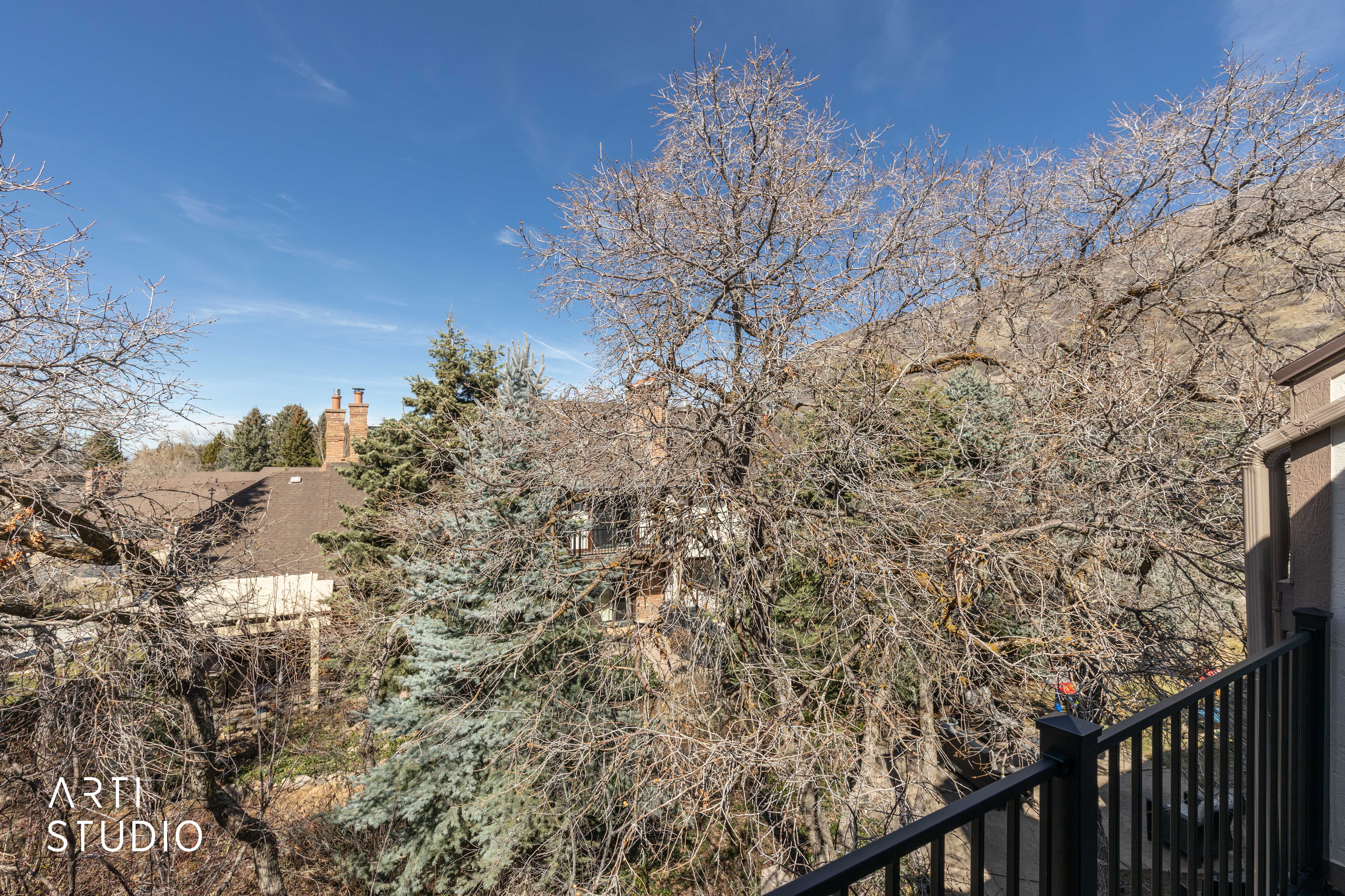 View of yard featuring a balcony