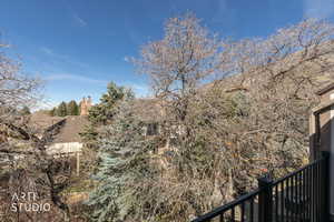 View of yard featuring a balcony