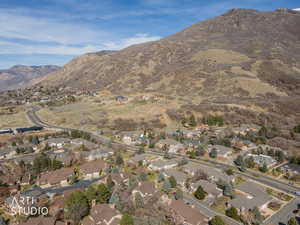 Aerial perspective of suburban area featuring mountains