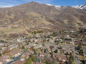 Aerial perspective of suburban area featuring mountains