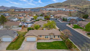 Aerial view of residential area with a mountain backdrop