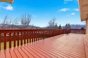 Wooden deck with a mountain view south main level