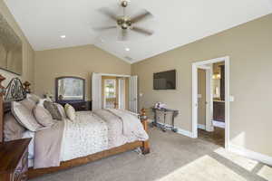 Bedroom with light colored carpet, ceiling fan, ensuite bathroom, and recessed lighting