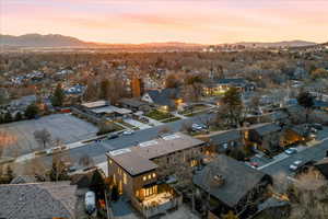 Aerial view at dusk of a mountain view and a residential view