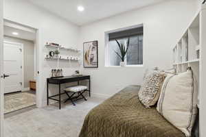 Bedroom featuring baseboards and recessed lighting