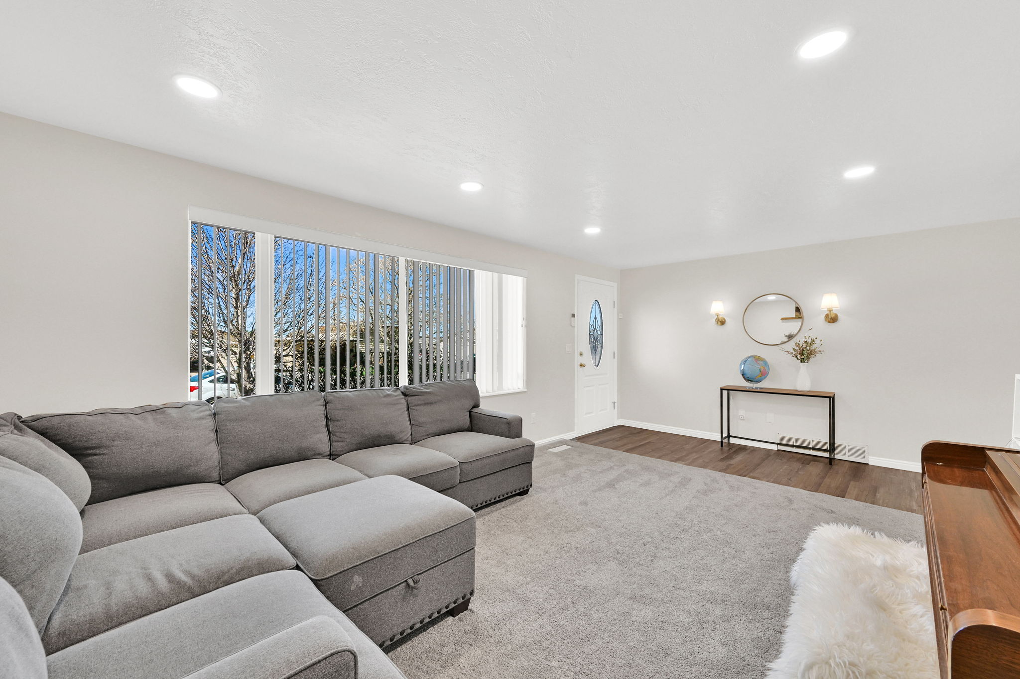 Living room featuring baseboards and wood finished floors