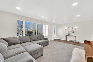 Living room featuring baseboards and wood finished floors