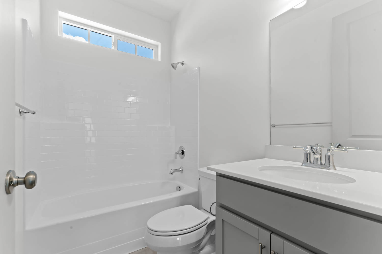 Bathroom with vanity and shower / tub combination