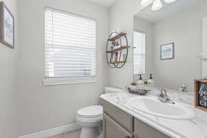 Bathroom with vanity and toilet