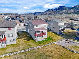 Aerial perspective of suburban area featuring mountains