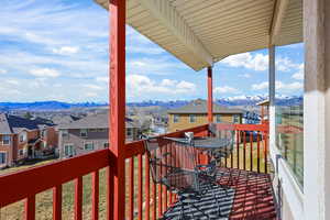 Balcony with a mountain view and a residential view