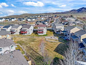 Aerial perspective of suburban area featuring mountains