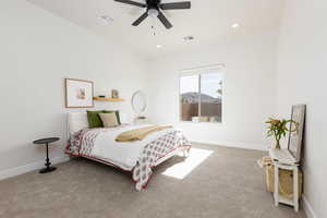 Bedroom featuring ceiling fan, carpet, and recessed lighting