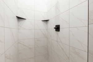 Bathroom view of tiled shower
