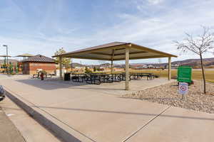 View of home's community with a patio area and a mountain view