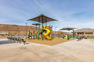 Community jungle gym with a mountain view