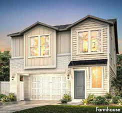 View of front facade with a garage, board and batten siding, and driveway