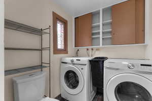 Laundry area with separate washer and dryer