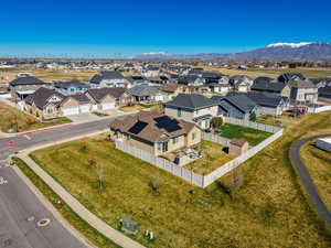 Aerial view of residential area featuring mountains