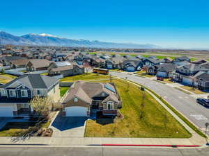 Aerial view of residential area featuring mountains
