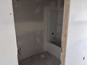 Full bathroom with bathtub / shower combination