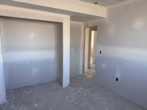 Unfurnished bedroom with a closet