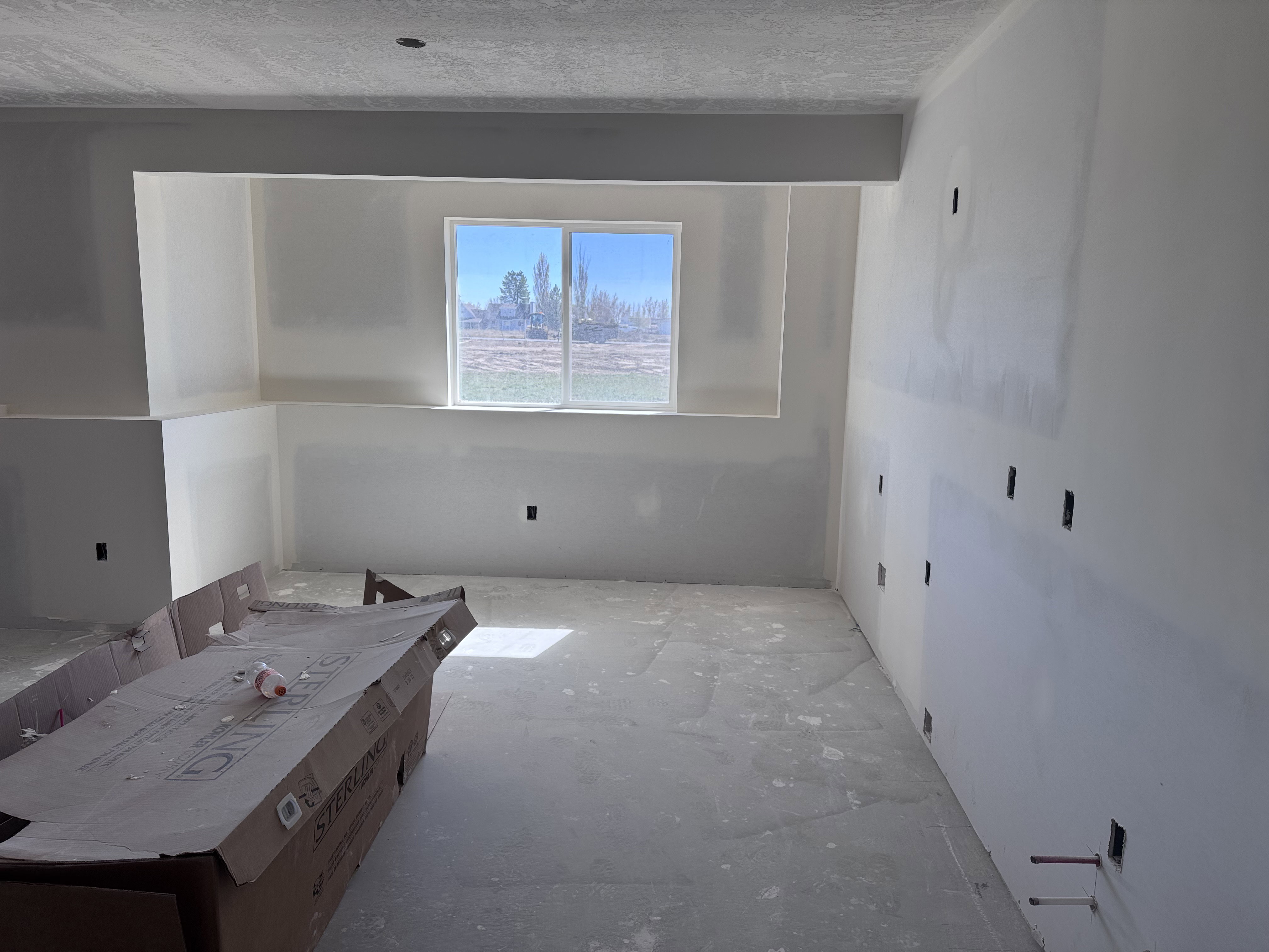Bathroom with vanity and a textured ceiling