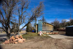 View of side of home with a chimney